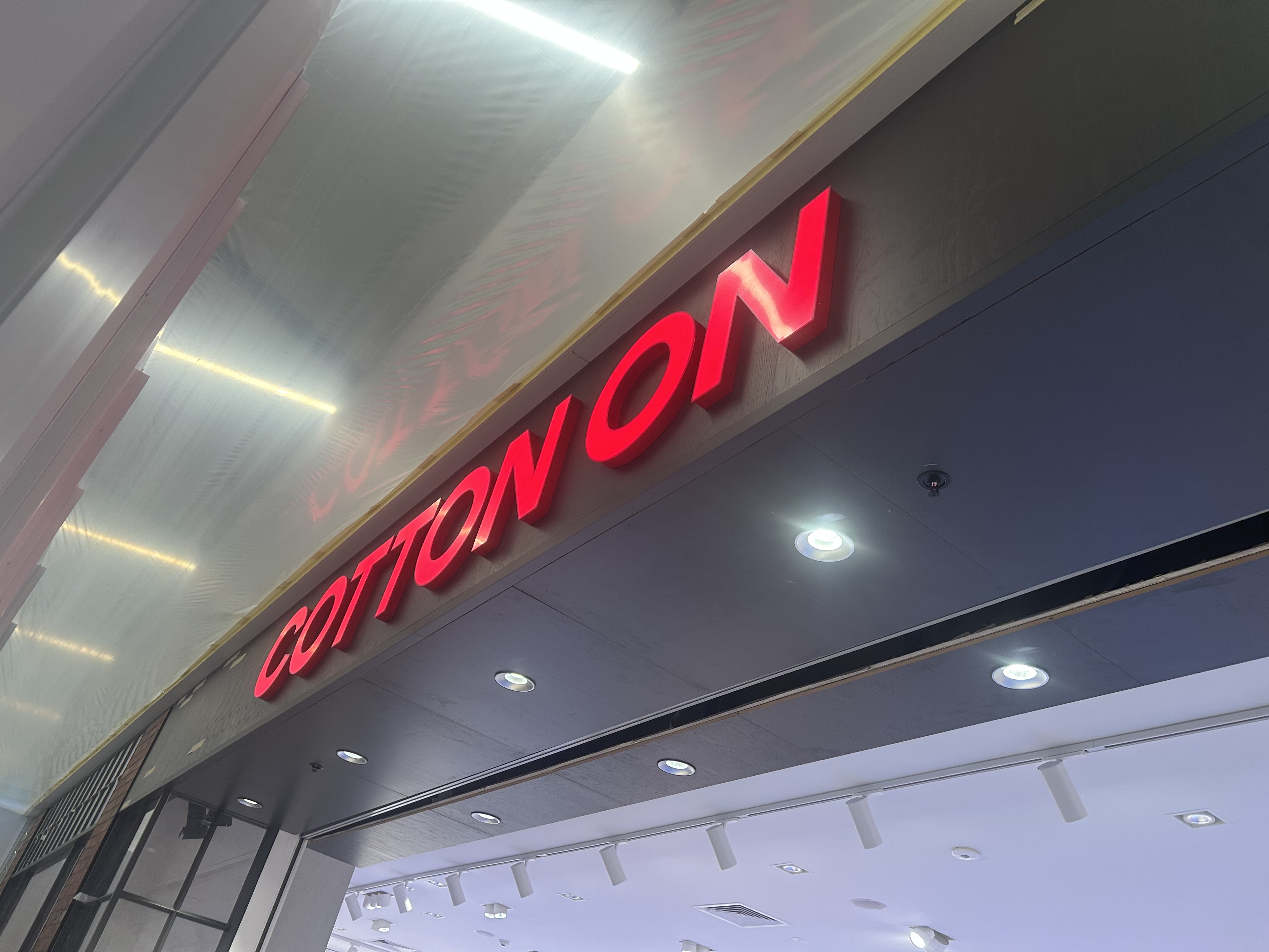 Cotton On retail shopfront rebrand with façade signage and window vinyl