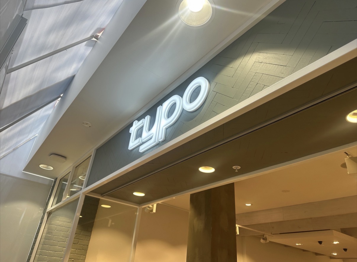 Illuminated shopfront sign detail